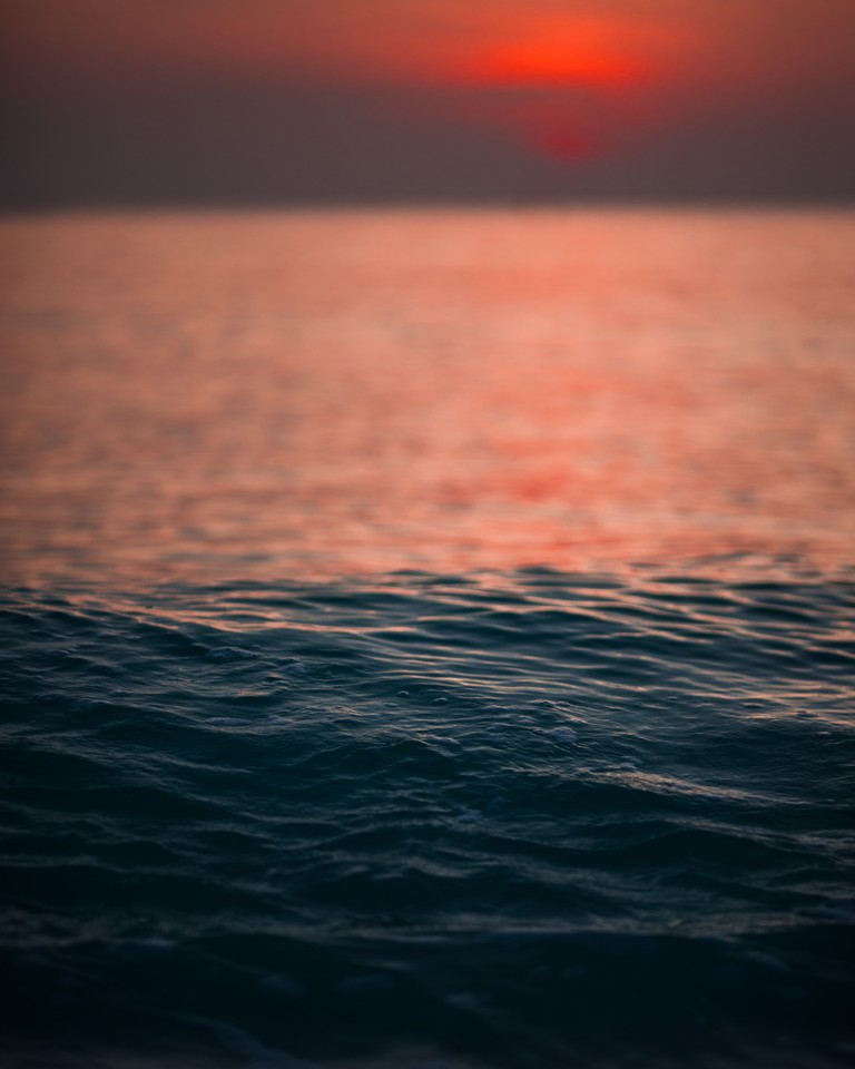 Beautiful Sunset Wallpaper Over the Calm Ocean