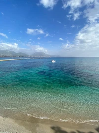 Stunning Wallpaper of Azure Waters and Cumulus Clouds