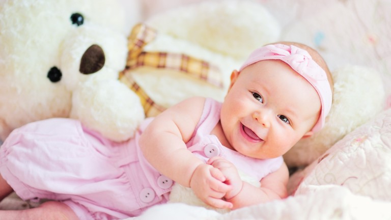 Charming Baby with Teddy Bear - High-Quality Wallpaper