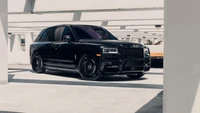 Téléchargez le fond d'écran ultime de Rolls Royce Cullinan noir