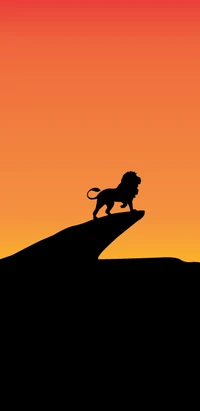 Siluète de Lion Majestueux Contre un Coucher de Soleil Éblouissant