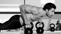 Eleva tu Viaje Fitness con Nuestro Fondo de Pantalla de Kettlebell