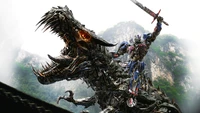 Optimus Prime in Action: Stunning Wallpaper for Transformers Lovers