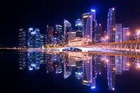 Explora la Impresionante Reflexión del Skyline Nocturno de Singapur