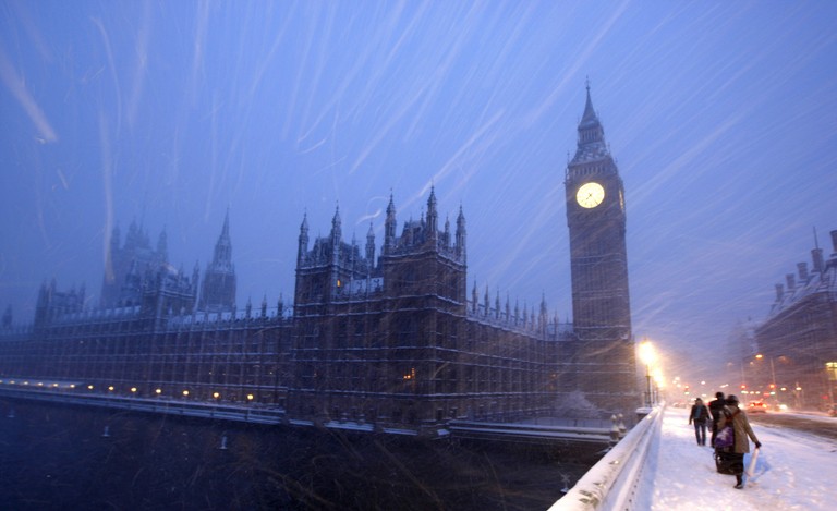 Download a Beautiful Wallpaper of the Houses of Parliament in Snow