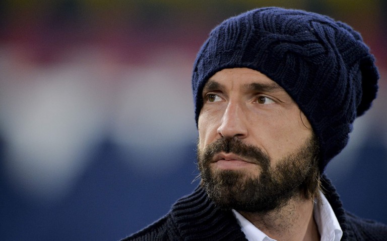 Italian Football Player in Beanie and Beard Wallpaper