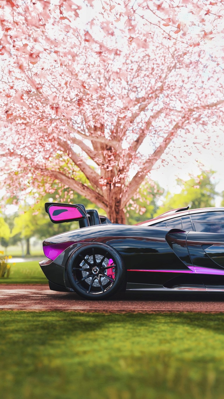 Download the McLaren Senna Wallpaper Surrounded by Cherry Blossoms