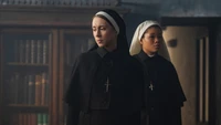 The Nun 2 Wallpaper Featuring Irene Palmer and Taissa Farmiga