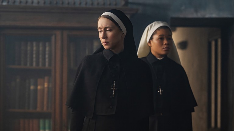 The Nun 2 Wallpaper Featuring Irene Palmer and Taissa Farmiga