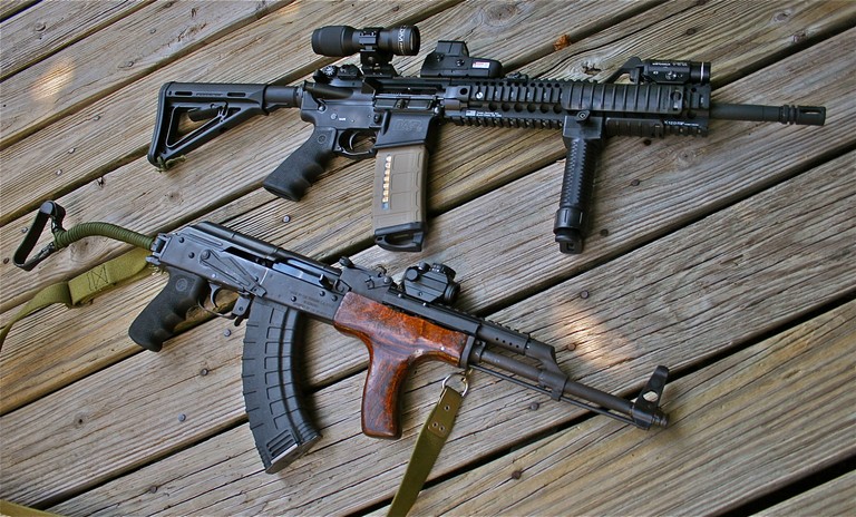 Stunning Rifle Wallpaper Featuring M4 Carbine and AK-47