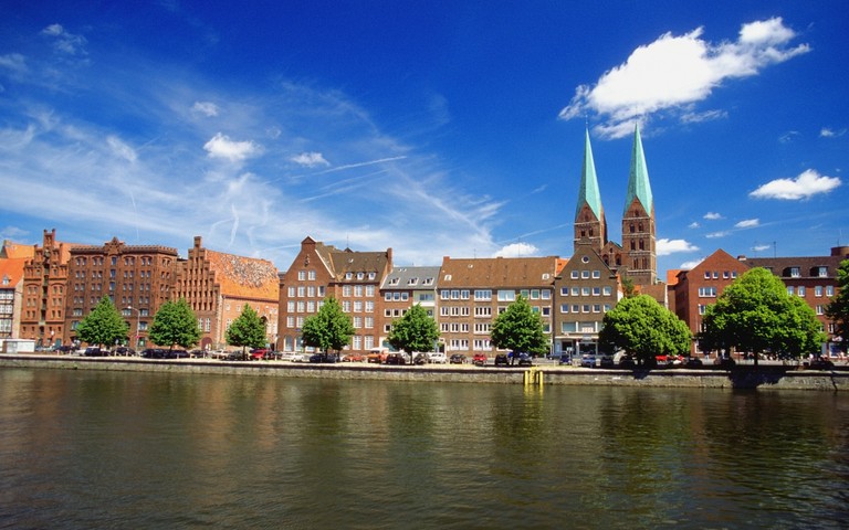 Discover the Beauty of Germany's Waterway and Town Reflections