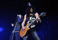 Incroyable fond d'écran de Guns N' Roses avec Slash en performance