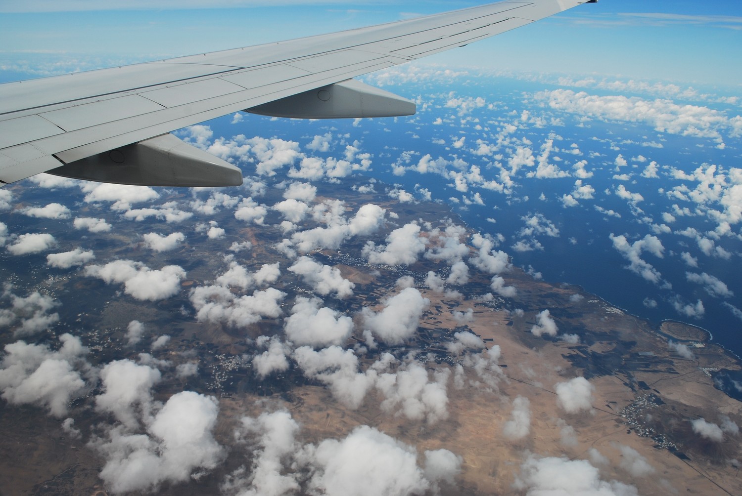 Beautiful Daytime View from an Airplane Wing