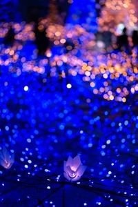 Fond Bokeh Bleu Électrique : Votre Décor Parfait pour les Fêtes