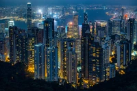 Descargar Impresionante Fondo de Pantalla 4K de la Ciudad de Hong Kong por la Noche