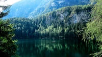 Beautiful Wilderness Wallpaper Featuring a Reflective Lake