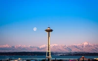 Space Needle de Seattle con un Hermoso Telón de Fondo Montañoso