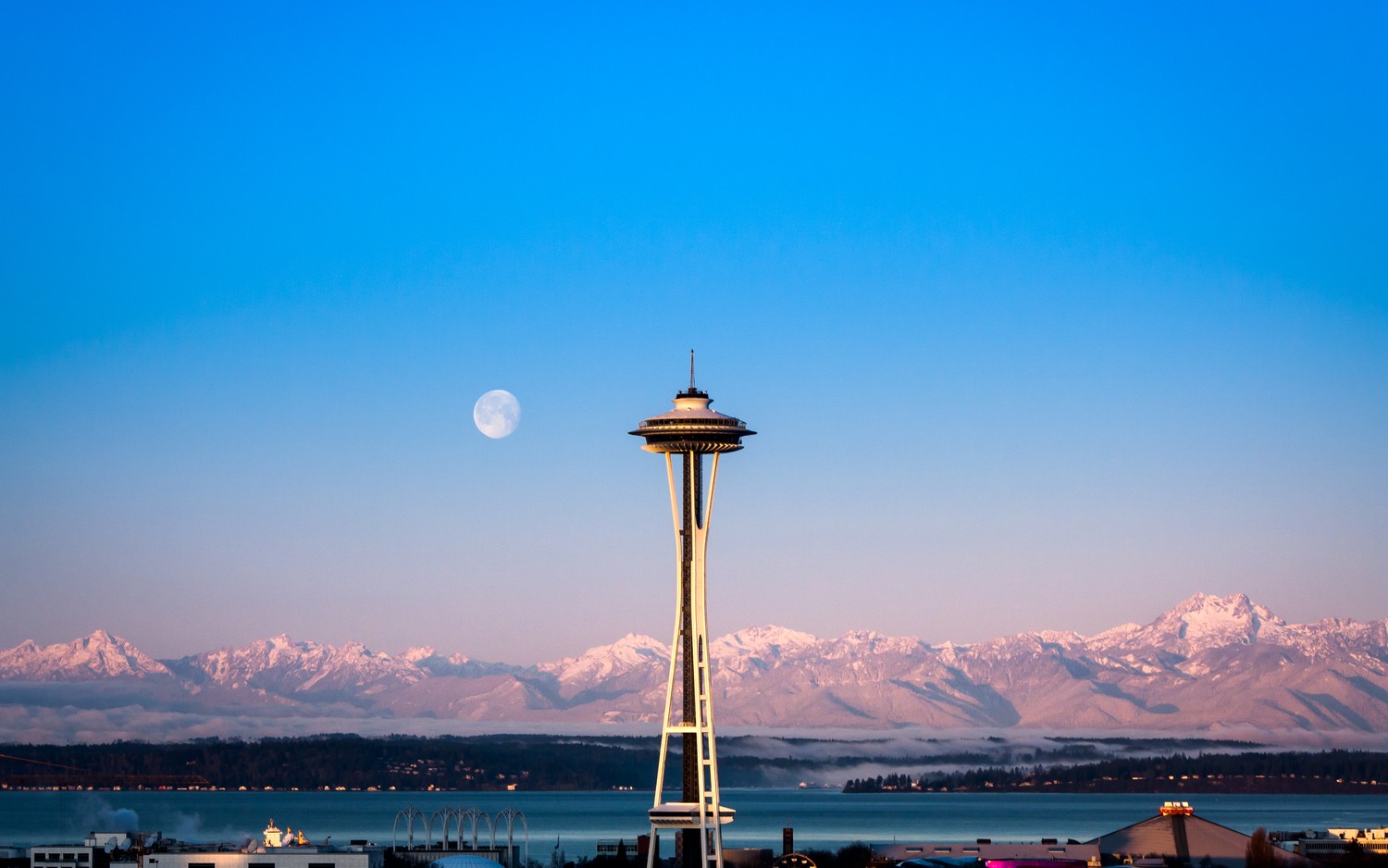 Seattle Space Needle Against a Beautiful Mountain Backdrop