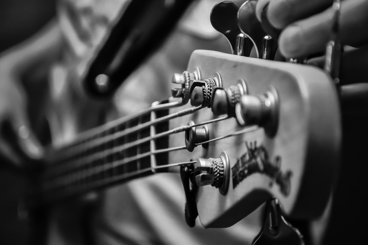 Bass Guitar Wallpaper in Striking Black and White