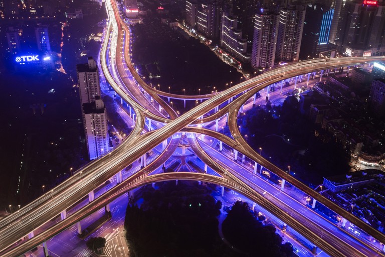 Explore the Nighttime Cityscape: Aerial View of a Stunning Interchange