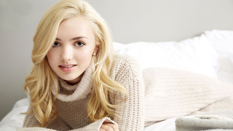 Beautiful Young Woman in Cozy Sweater Wallpaper