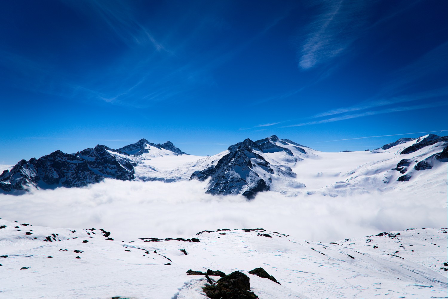 Download Breathtaking Snow-Covered Mountain Views