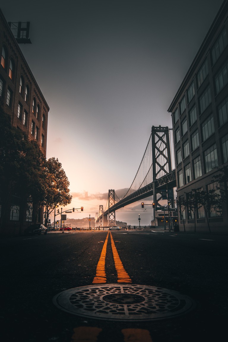 Explore the Bay Bridge: A Beautiful San Francisco Sunset Wallpaper