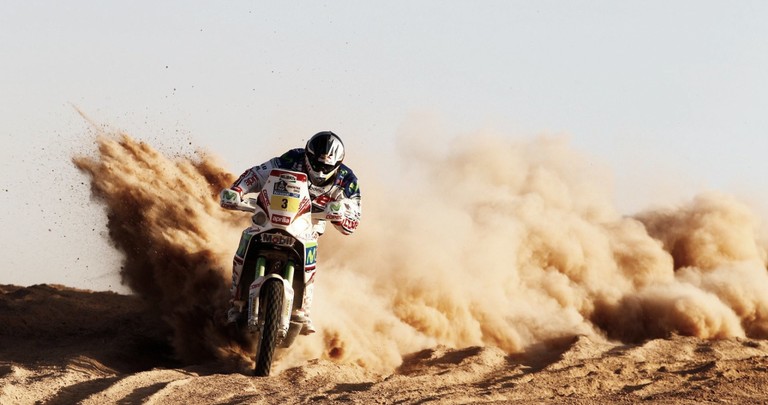 Thrilling Dakar Motorcycle Racing Wallpaper