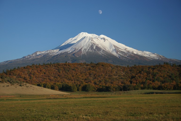 Explore Breathtaking Snow-Capped Volcano Landscape