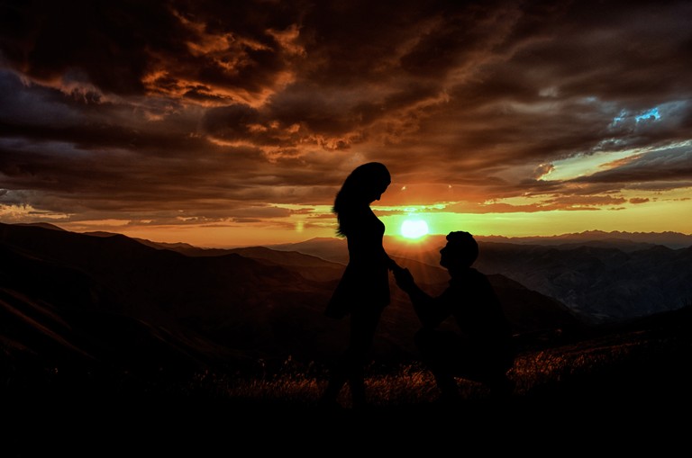 Capture the Perfect Moment: Sunset Marriage Proposal Wallpaper