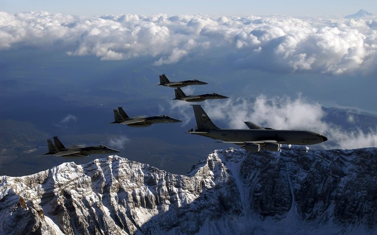 Experience the Thrill of Military Flight with Our Stunning Wallpaper