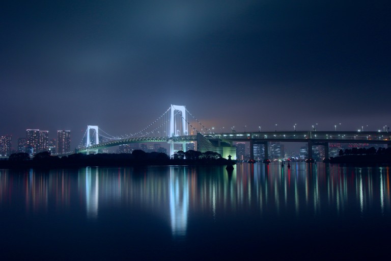 Download the Breathtaking Rainbow Bridge Night Wallpaper