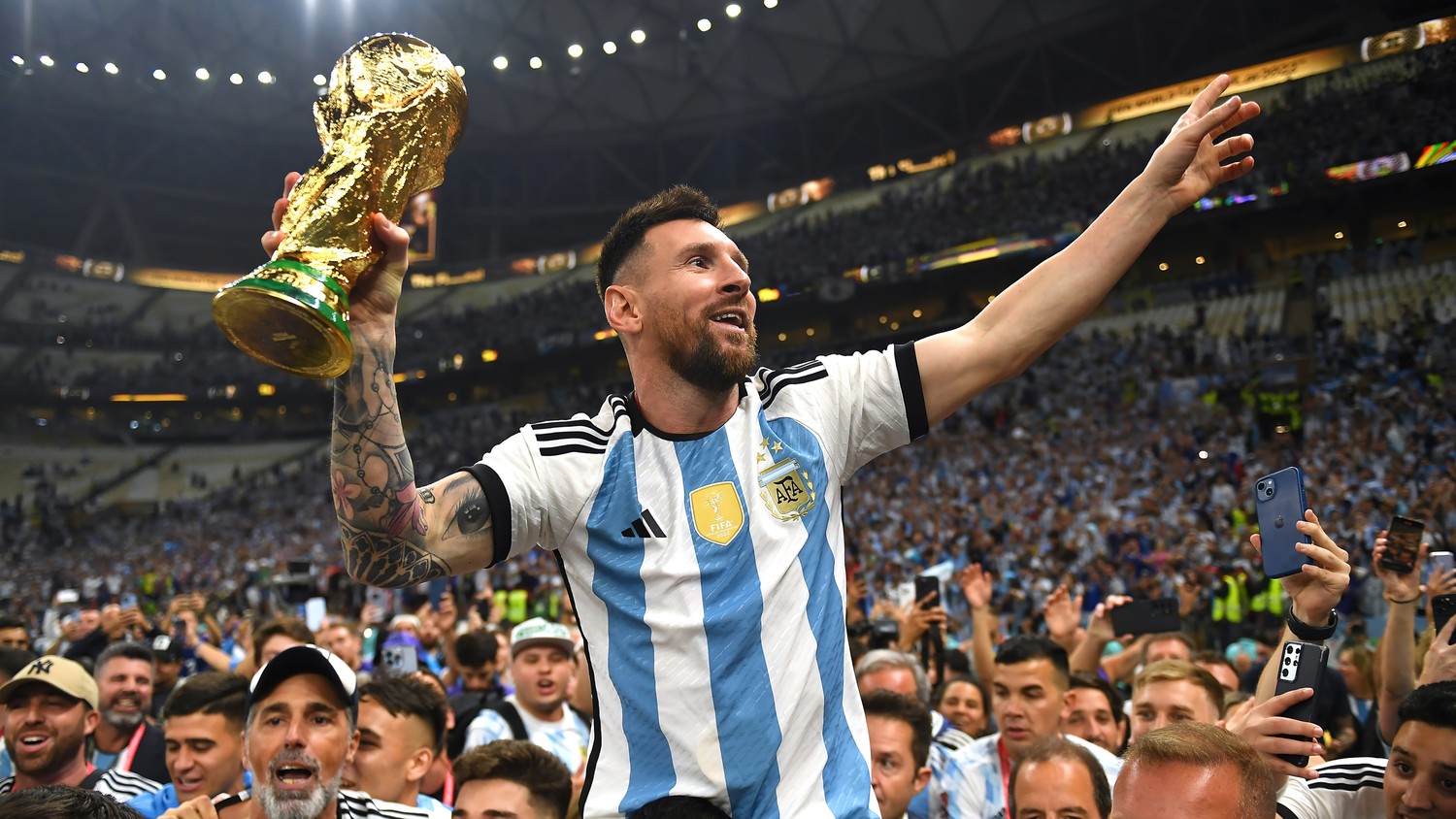 Inspire Your Space with Lionel Messi's World Cup Victory Wallpaper