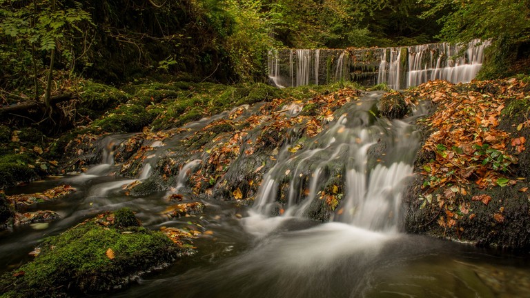 Breathtaking Waterfall and Stream Wallpaper