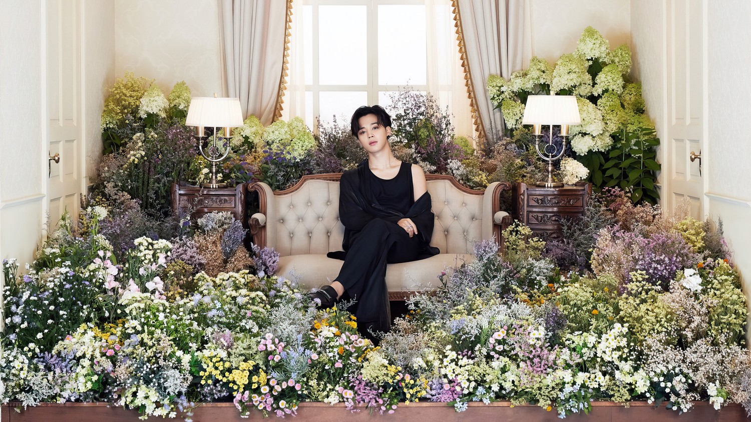 BTS Jimin in a Beautiful Flower Garden Wallpaper