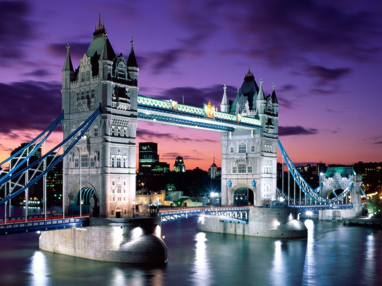 Tower Bridge at Night: Captivating Reflection on the River Thames