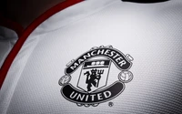 Fondo de pantalla del emblema de Manchester United FC