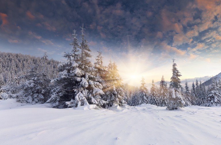 Majestic Snowy Mountain Range at Sunrise