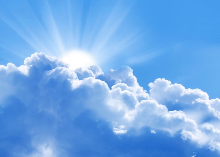 Stunning Blue Sky with Cumulus Clouds and Sunlight Wallpaper