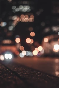 Descarga nuestro fondo de ciudad nocturna con luces bokeh