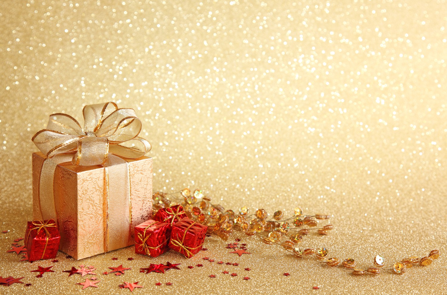 Celebrate Christmas with Our Stunning Gold Present Wallpaper