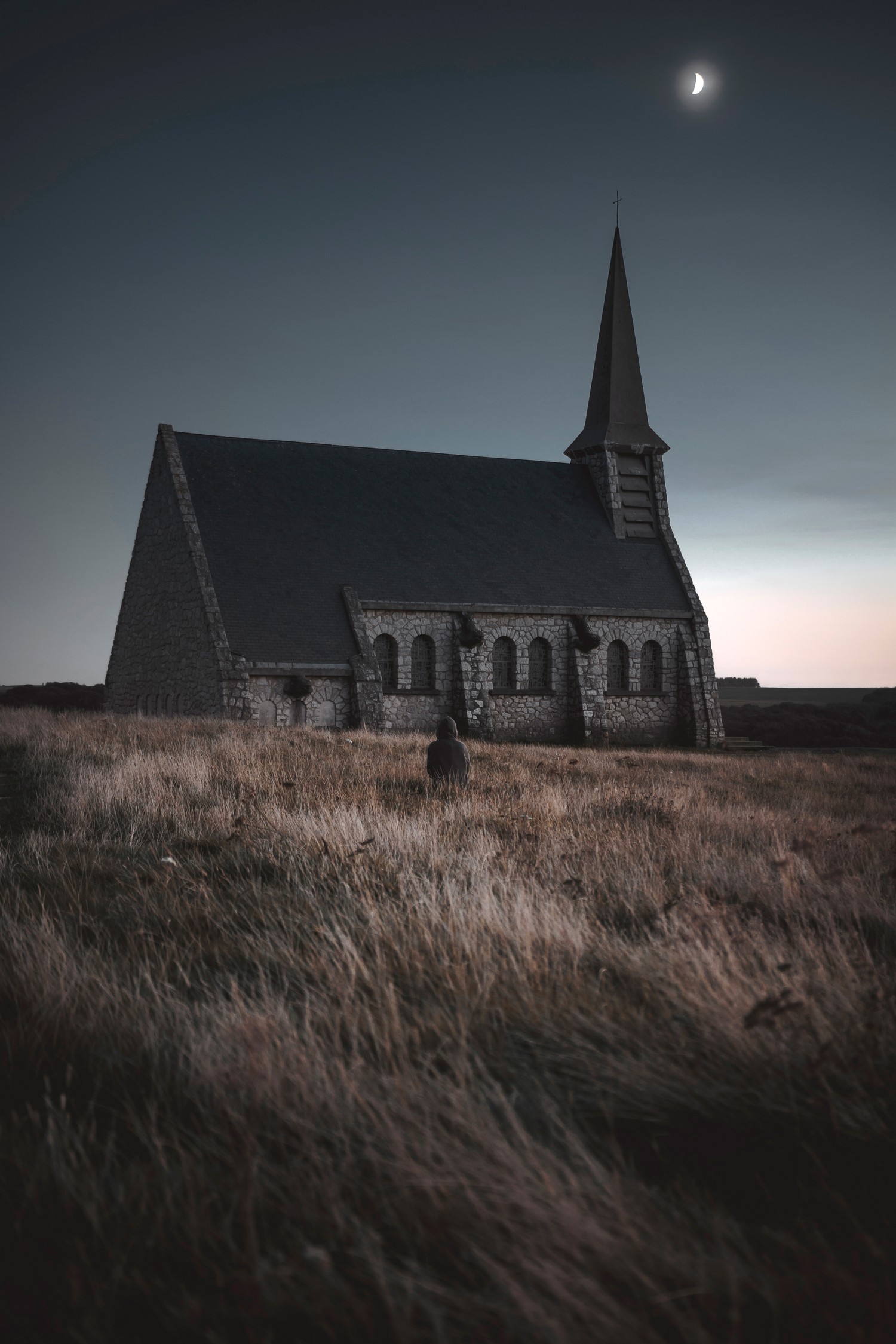 Beautiful Nighttime Church in a Rural Setting Wallpaper