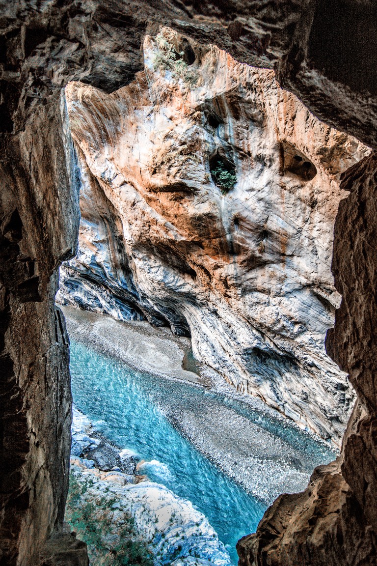 Explore the Beauty of Nature: Canyon and Waterfall Wallpaper