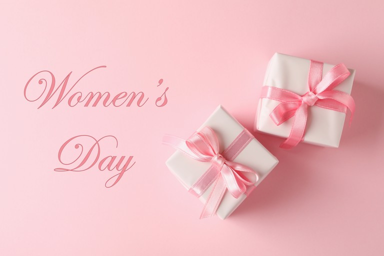 Download Our 5K Women's Day Wallpaper with Gift Boxes