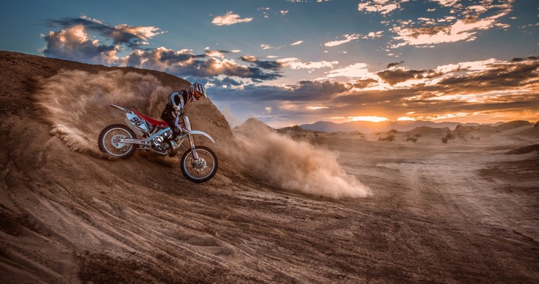 Epic Freestyle Motocross Action Wallpaper