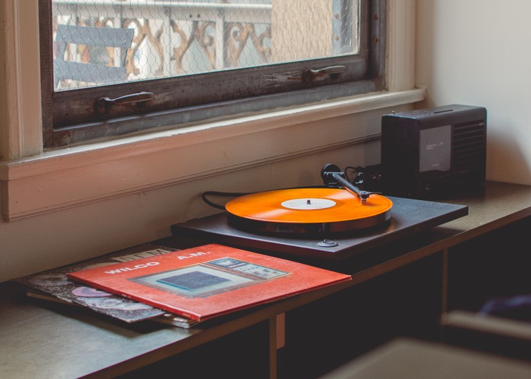 Download the Vibrant Orange Phonograph Record Wallpaper