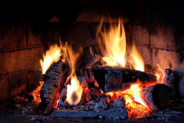 Warm & Inviting Fireplace Wallpaper