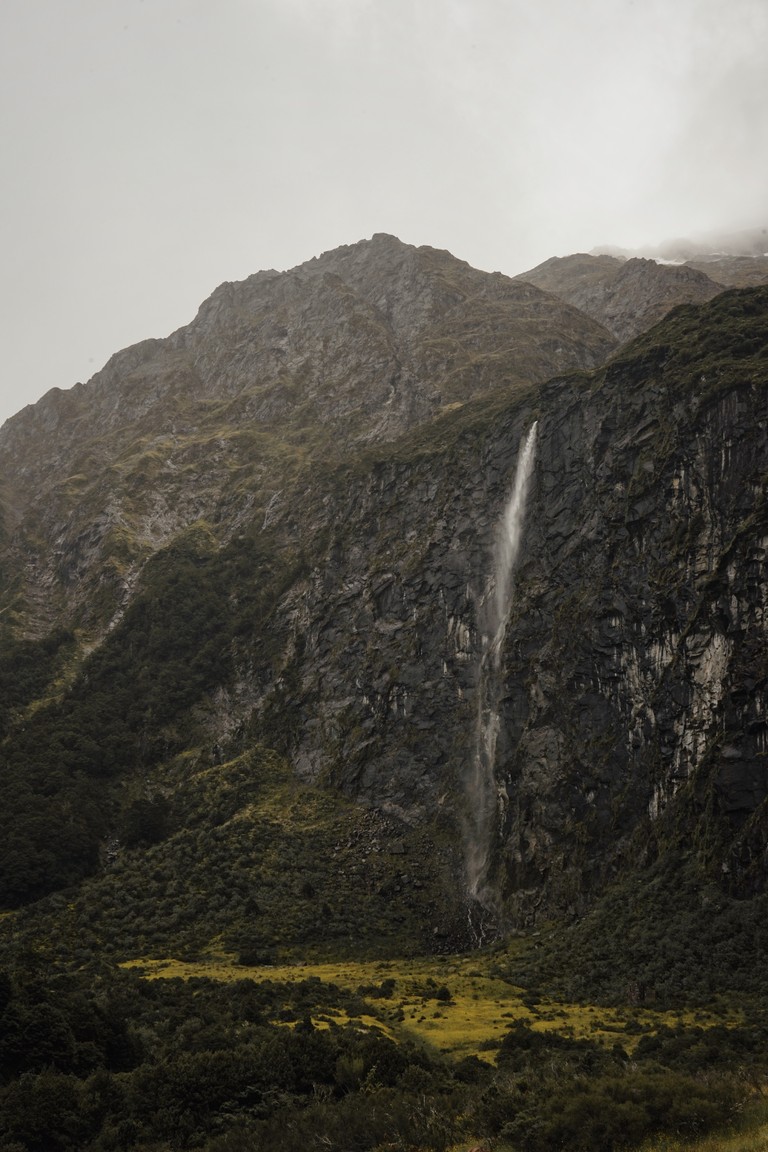 Breathtaking Waterfall Scene in a Mountainous Landscape