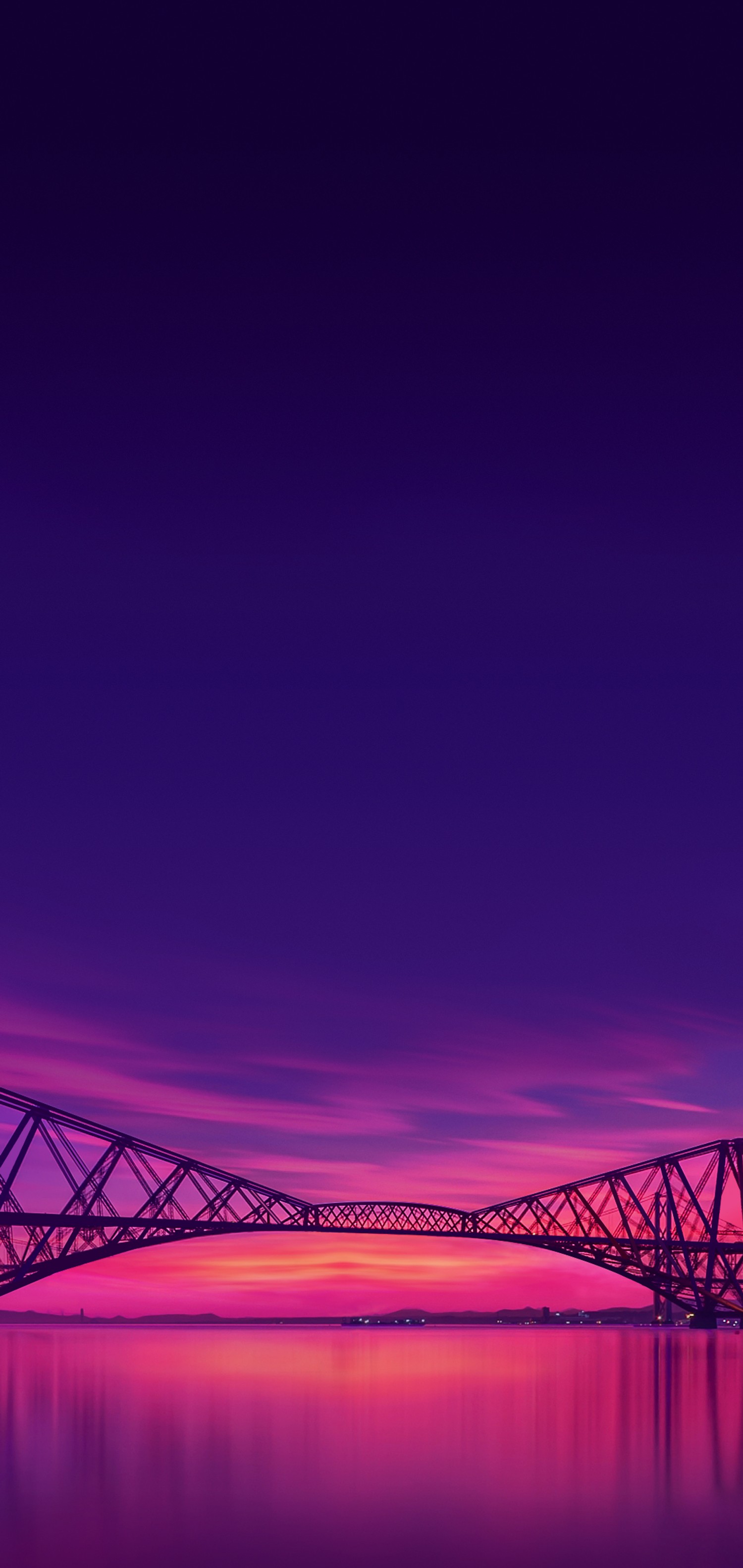 Download Stunning Purple Sunset Wallpaper Featuring a Majestic Bridge