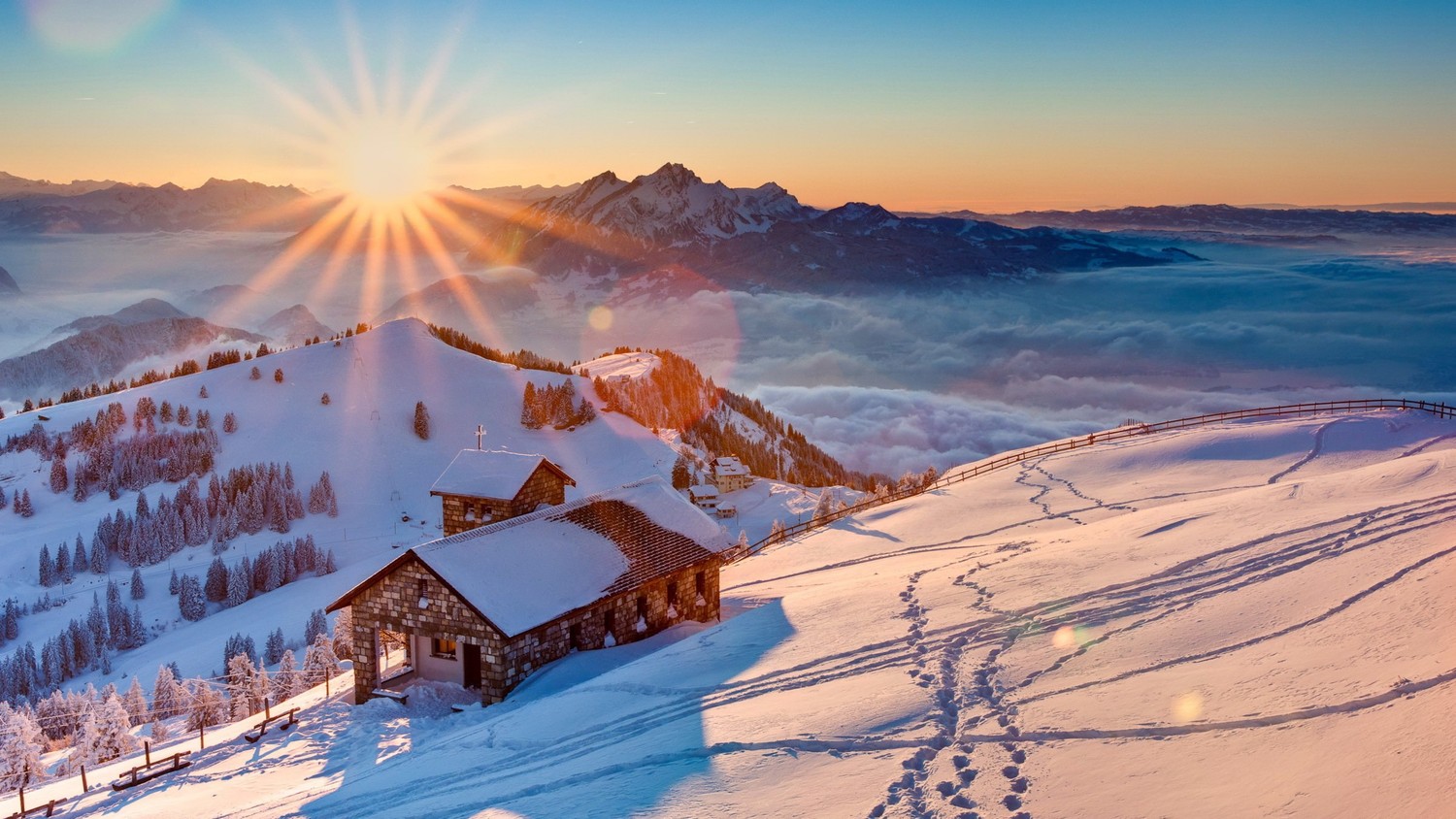 Beautiful Winter Mountain Sunrise with Cozy Cottage